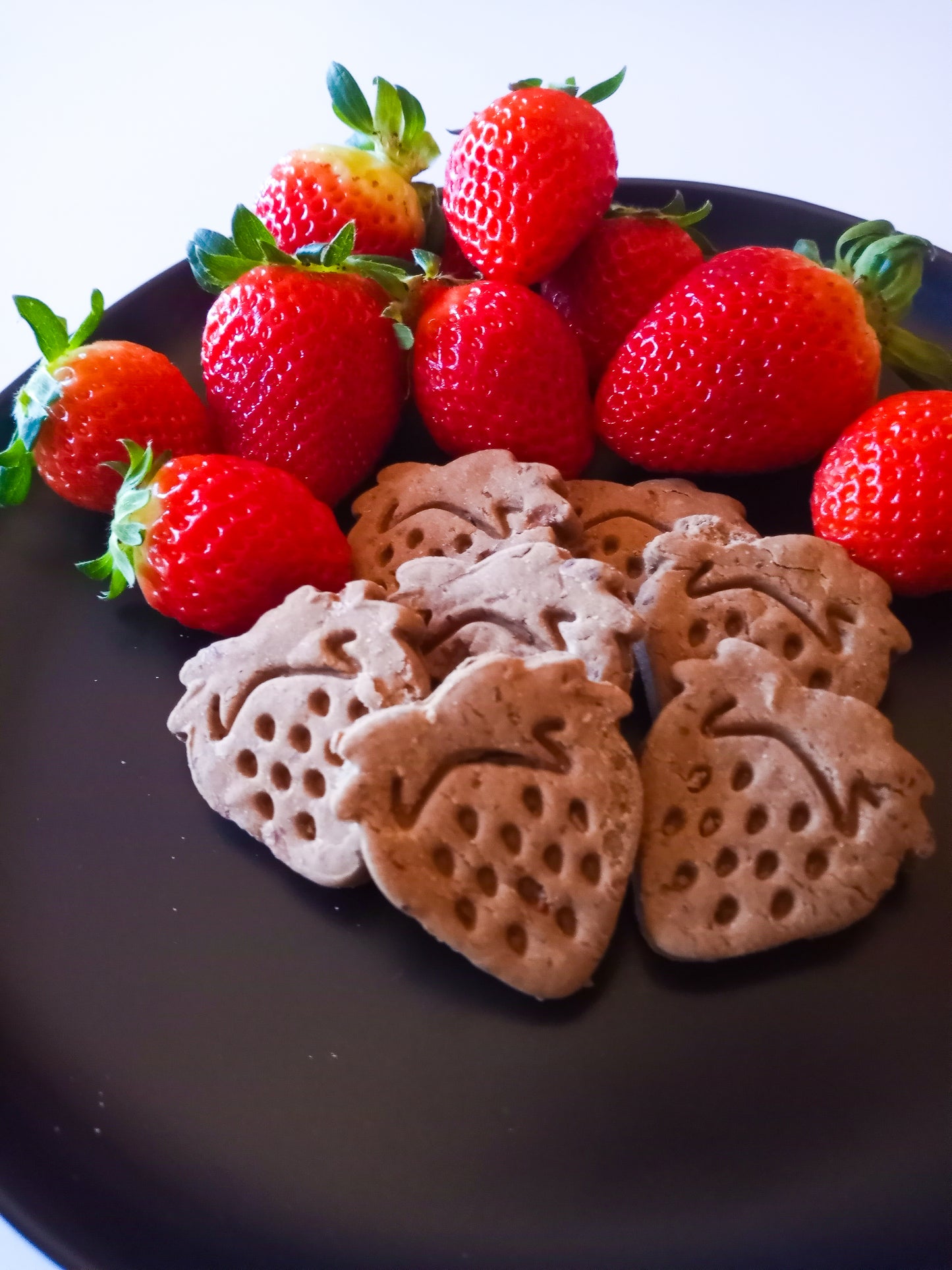 Chocolate Covered Strawberry Biscuits featuring unsweetened carob powder & strawberries in cute strawberry shapes.